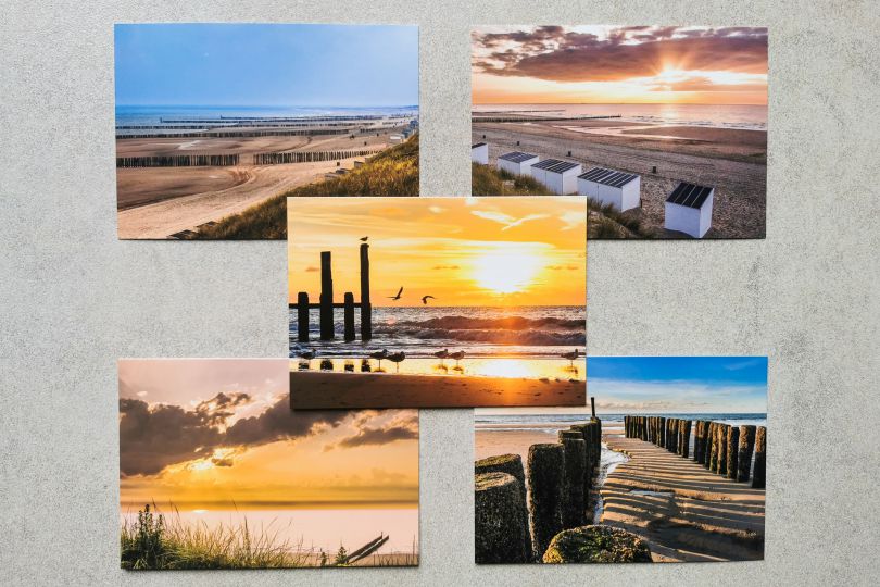 5 verschillende ansichtkaarten van het strand