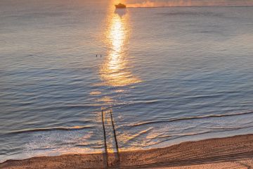 De zon zien zakken in de zee bij Valkenisse
