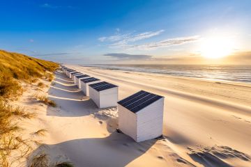 De schaduwen van het strand